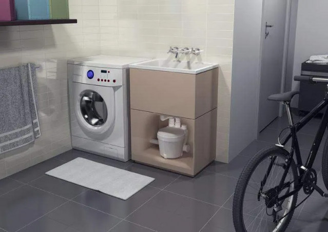Compact lifting station for kitchen / laundry