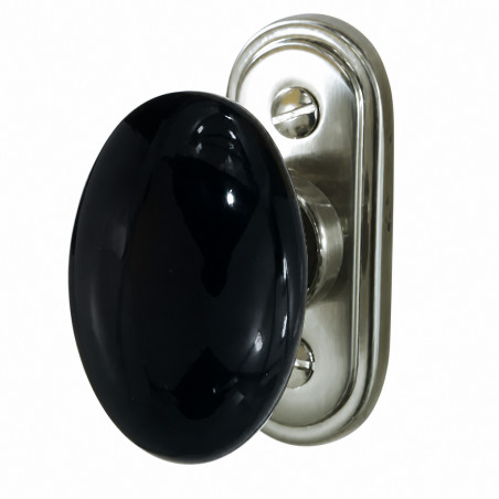 Bouton de fenêtre ovale en porcelaine noire sur platine zamak nickelée satinée.
